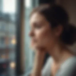 A woman looking thoughtfully out of a window, symbolizing contemplation in a relationship.