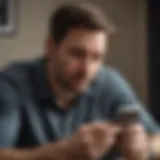 A worried husband looking at a text message