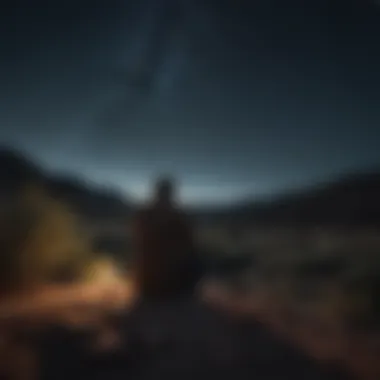 Contemplation Under the Night Sky Lonely man gazing at a starlit sky