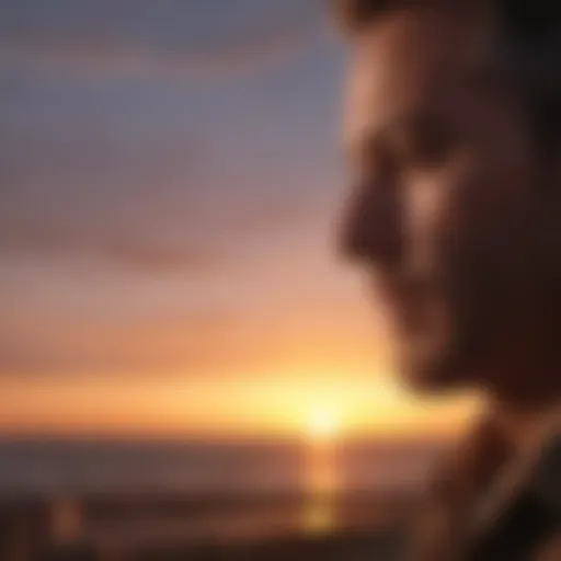 A man reflecting on his feelings during a sunset