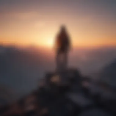 Silhouette of a person on a mountaintop at sunrise