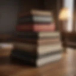 A stack of classic self-help books on a wooden table